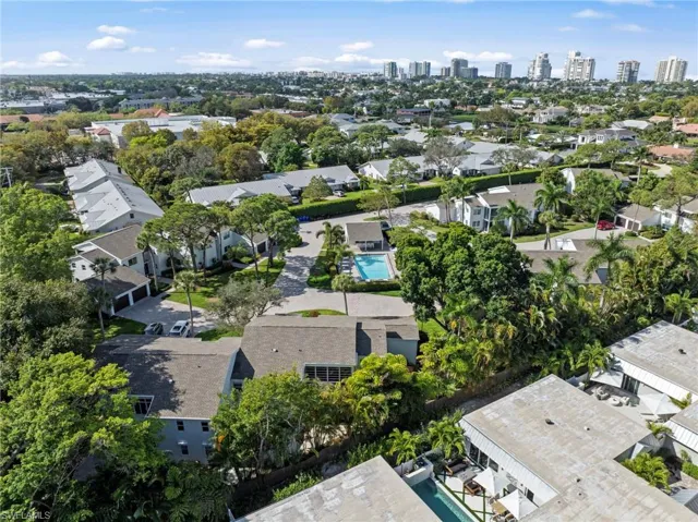 Aerial perspective of suburban area featuring skyline