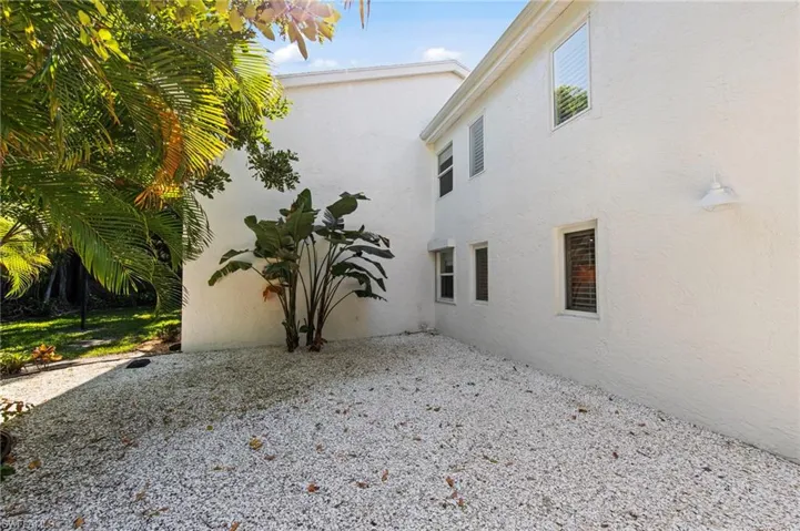 View of home's exterior featuring stucco siding