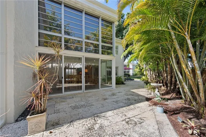 Rear view of property featuring a patio