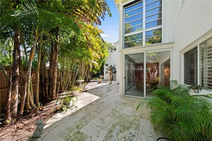 Fenced backyard with a patio area