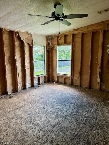 Spare room with a ceiling fan