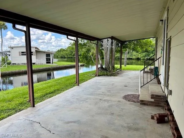 View of patio featuring a water view