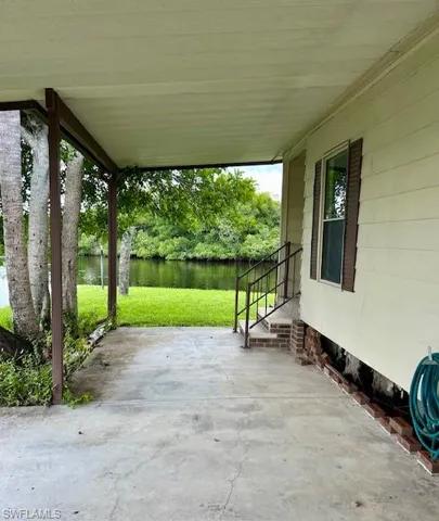View of patio featuring a water view