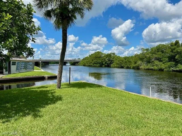 Water view featuring a notable bridge