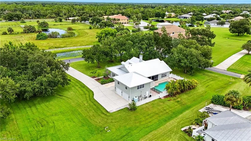 Aerial view of a large body of water and a pool
