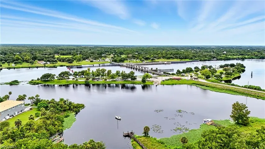 Aerial view of a notable bridge and a nearby body of water