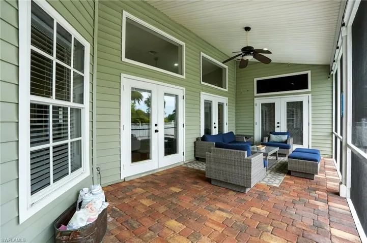 View of patio / terrace with french doors, outdoor lounge area, and a ceiling fan