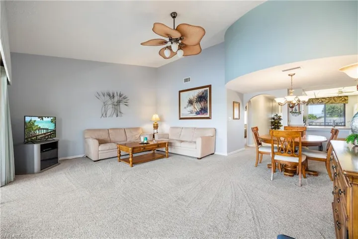 Light-toned wall-to-wall carpeting throughout the main living area