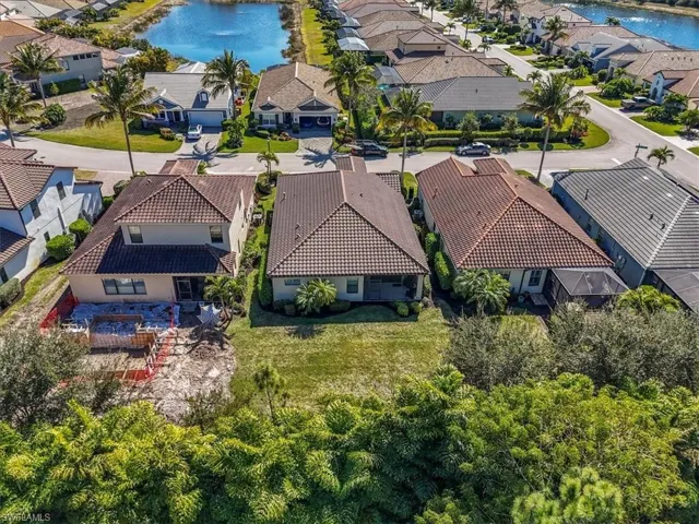 Aerial view of residential area with a large body of water