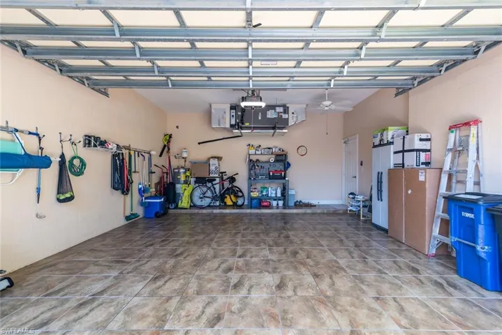 Garage featuring ceiling fan