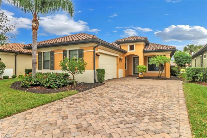 front of house with long drive way