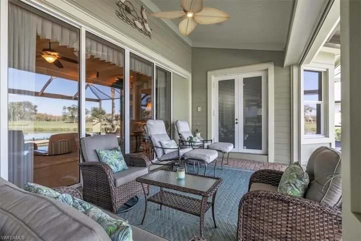Sunroom / solarium with an outdoor hangout area, a ceiling fan, french doors, and lofted ceiling