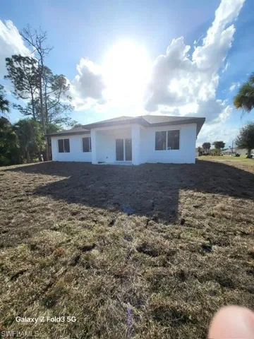 View of front of home featuring stucco siding