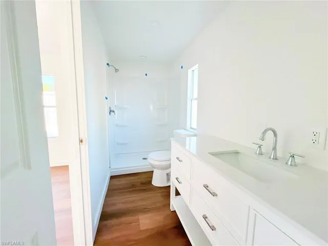 Fully remodeled with updated fixtures and contemporary design, the primary bath offers a clean, spa-like feel.