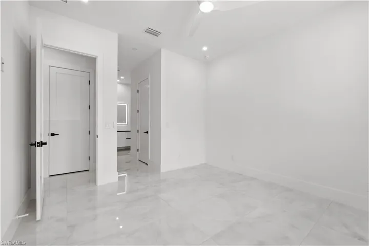 Unfurnished bedroom with recessed lighting and a ceiling fan