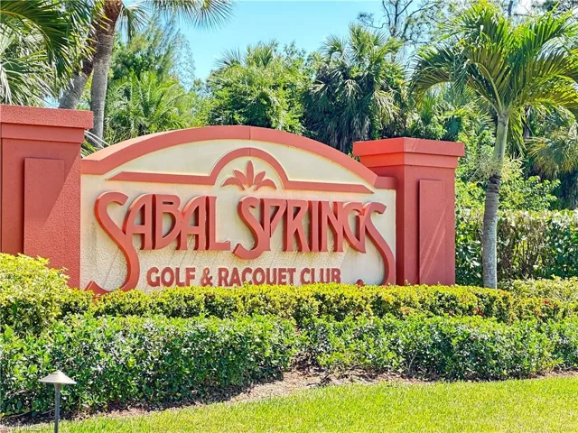 Welcome sign to Sabal Springs Golf & Racquet Club