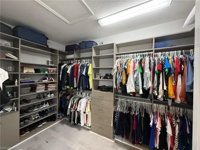 Walk in closet with attic access