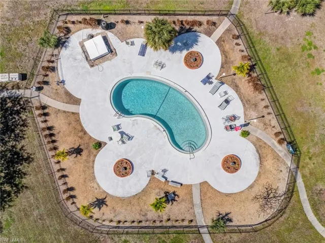 Residents enjoy access to a community pool, perfect for relaxing and soaking up the Florida sunshine.