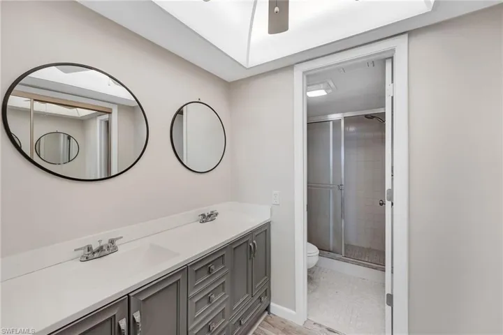 A well-appointed primary bath adds comfort and convenience to the home’s thoughtful layout.