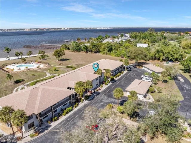 Views of the Cape Coral Bridge add a dynamic and distinctive backdrop to the waterfront setting.