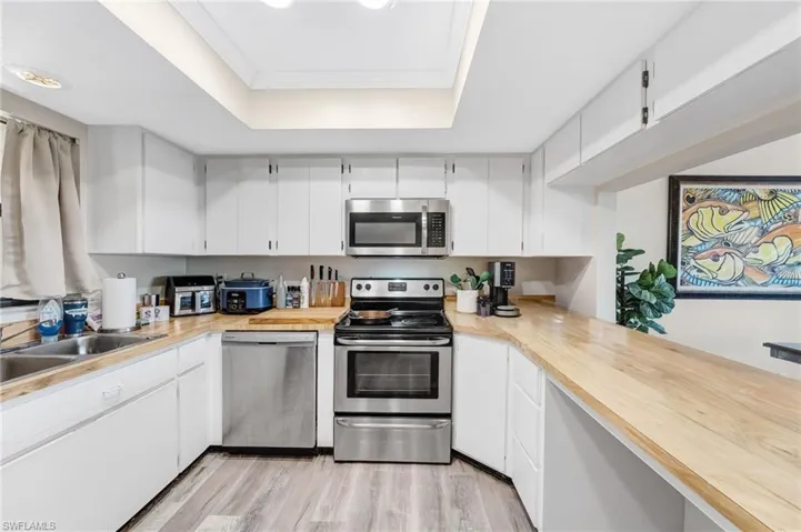 Designed for both everyday living and entertaining, the kitchen offers convenience and modern appeal.