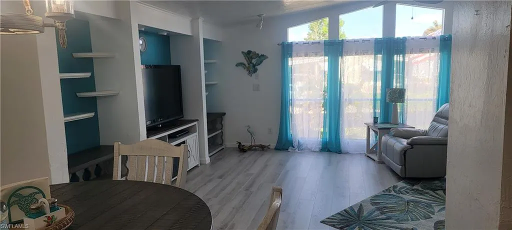 Light "Aqua Guard" Waterproof Vinyl Flooring throughout the entire home.