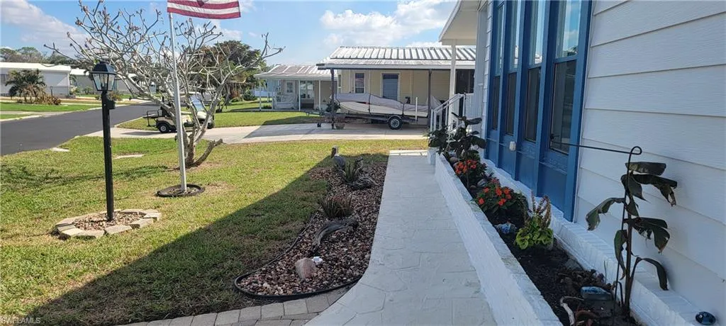 View of front sidewalk  & front yard