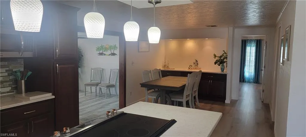 Kitchen featuring stovetop on the island