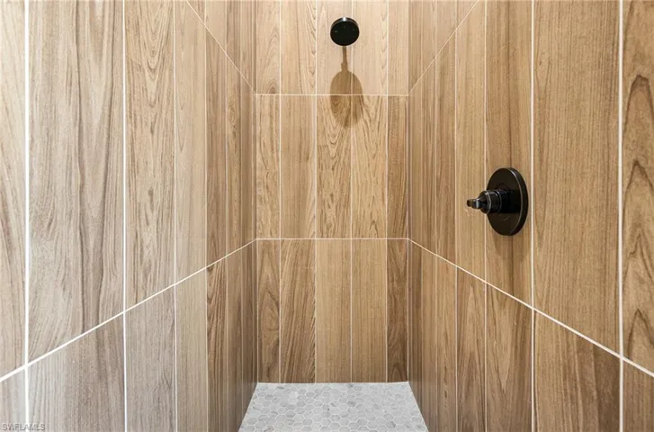 Interior details featuring walk in shower