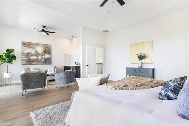 Spacious master complete with full seating area and wine bar