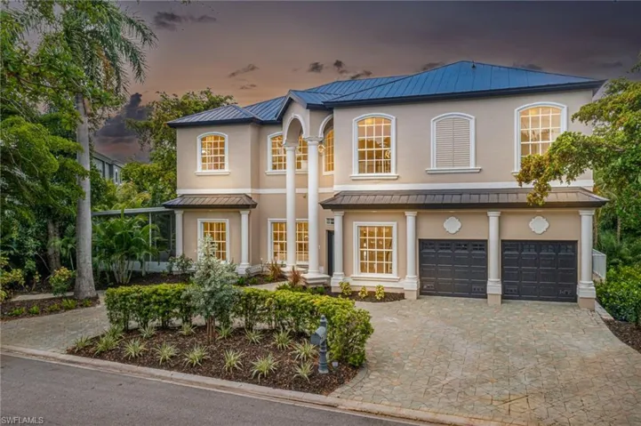 Welcome Home - Beautiful front elevation of home with circular driveway