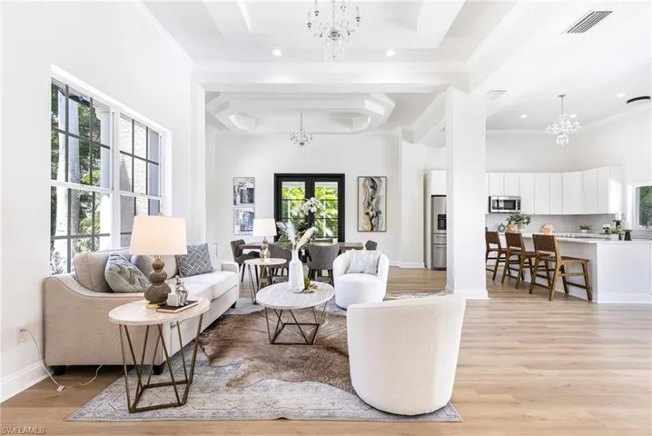 Dramatic and stunning open flooring with beautiful custom woodwork throughout. Light and bright with modern elegance.  Can you imagine walking into this welcoming space?