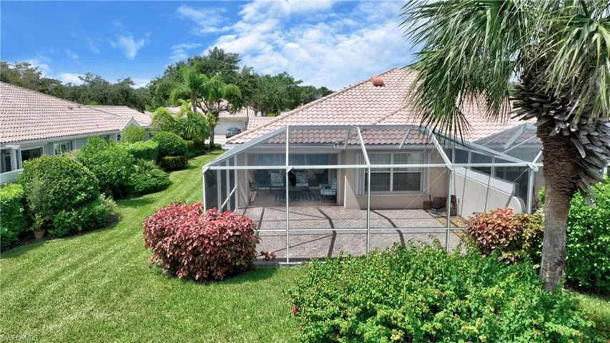 Screened lanai with a concrete patio