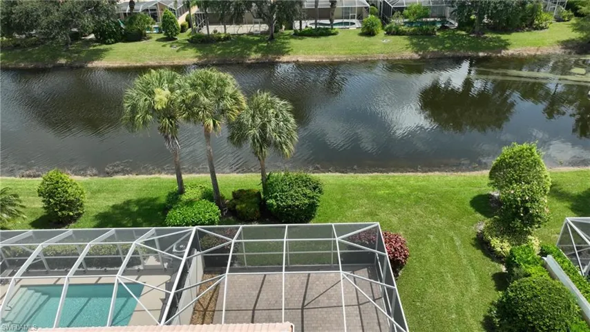Screened outdoor pool with surrounding patio space
