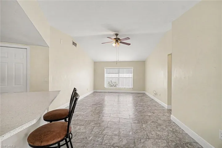 Breakfast bar leading into family room