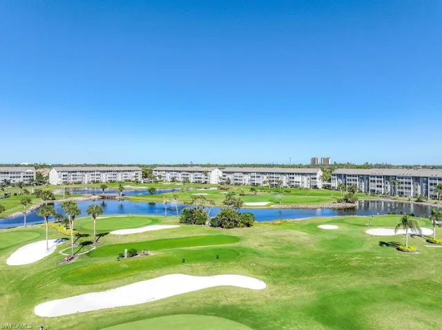 Surrounding community featuring a water view
