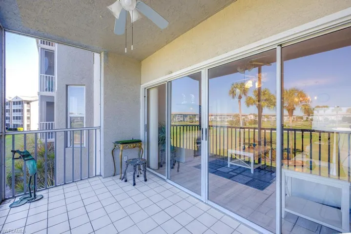 Balcony at dusk with ceiling fan