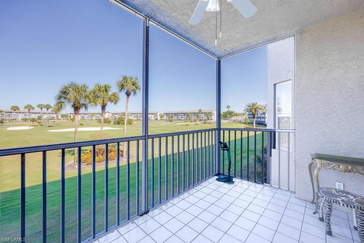 Balcony featuring ceiling fan