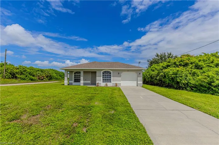 713 Cardinal St E, Lehigh Acres, Florida 33974