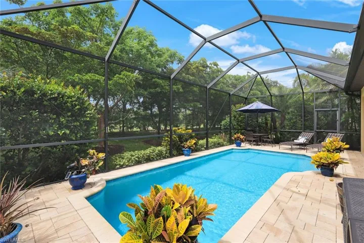 Gorgeous outdoor lanai area with heated pool.