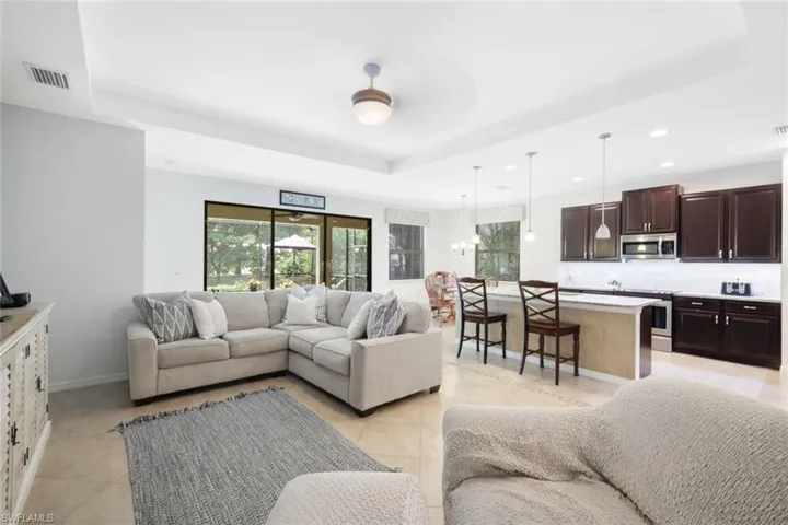 Open concept floor plan with tray ceilings.