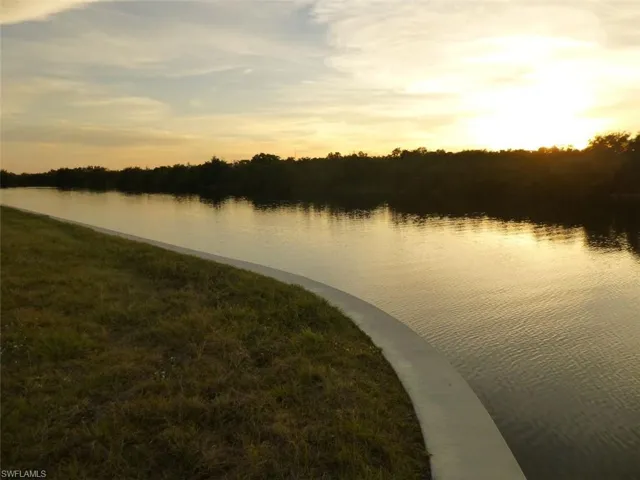 Water view with sunset over mangroves.