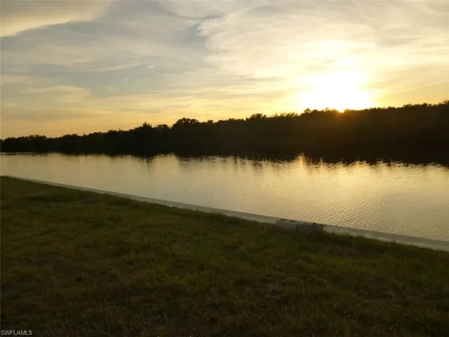Water view with sunset over mangroves.