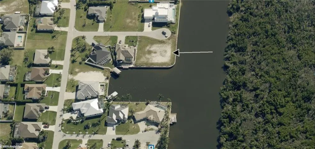 Aerial view of property and surrounding area, looking South.