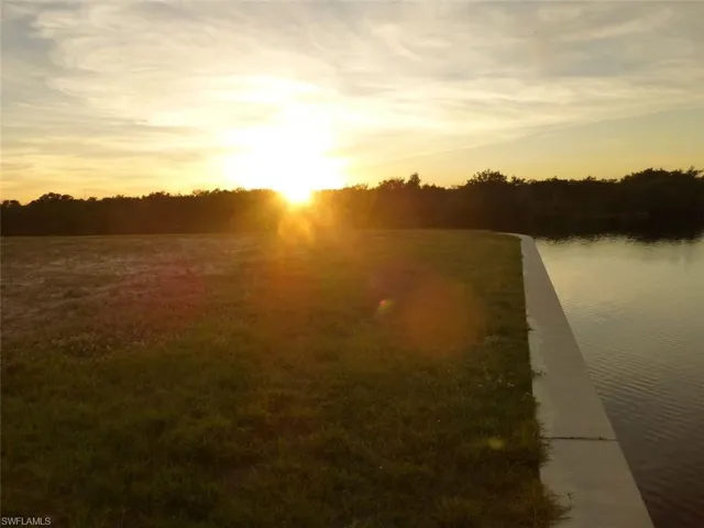 Water view with sunset over mangroves.
