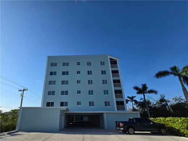 visitor parking lot, entrance to private garage
