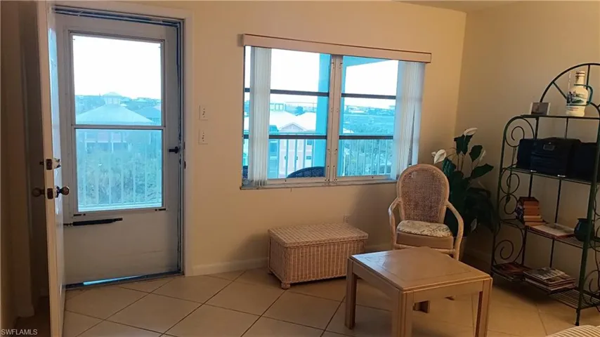 Doorway to outside featuring plenty of natural light