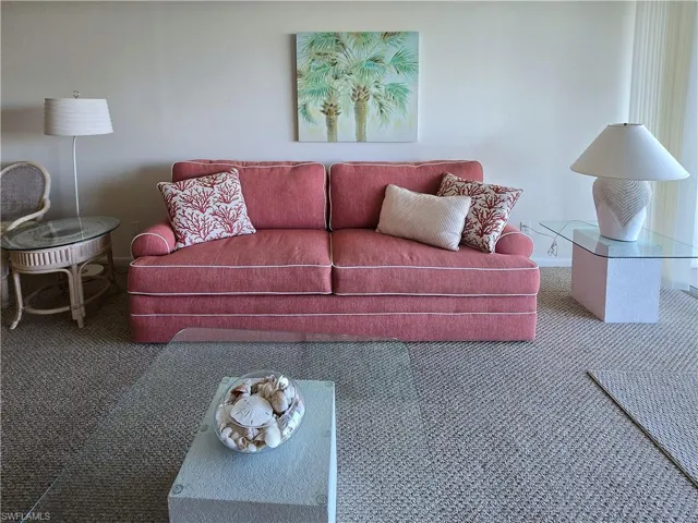 Living room featuring carpet floors