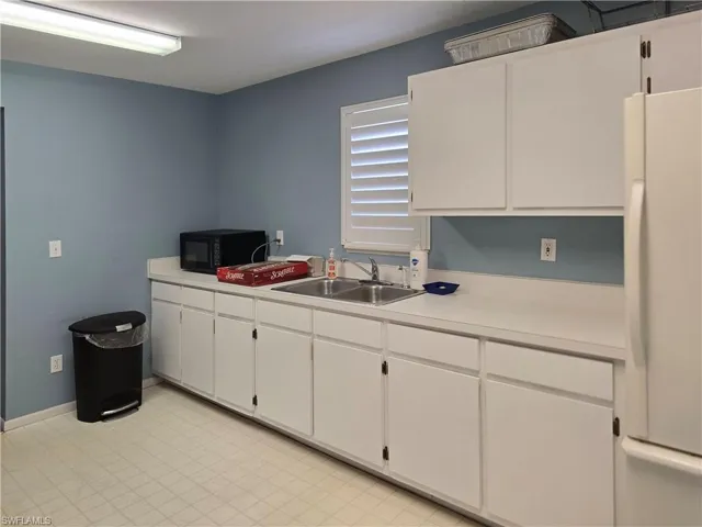 Clubhouse kitchen with refrigerator and microwave