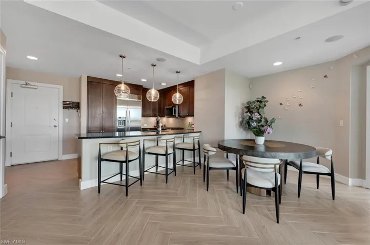 Freshly Painted walls & spacious Dining Area with Gorgeous floors and raised ceilings